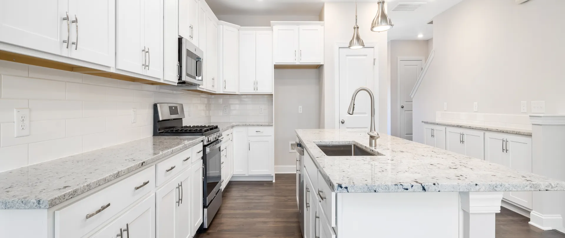 Modern 21st Century kitchen with high-gloss cabinets by CabinetEZ, Clinton, MD.